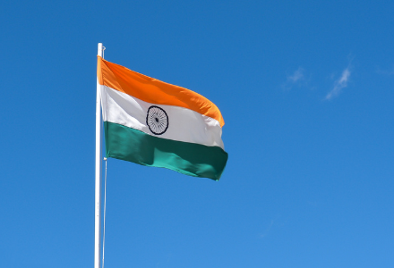 Picture of a blue sky and the Indian flag