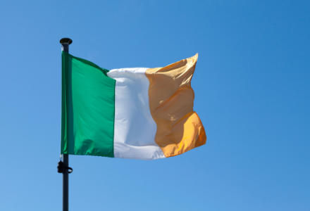 Picture of a blue sky and the Irish flag