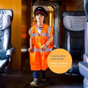 The little boy with a train inspector jacket