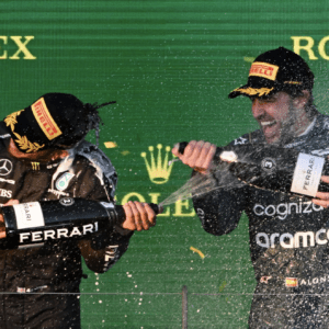 F1 drivers celebrate with champagne