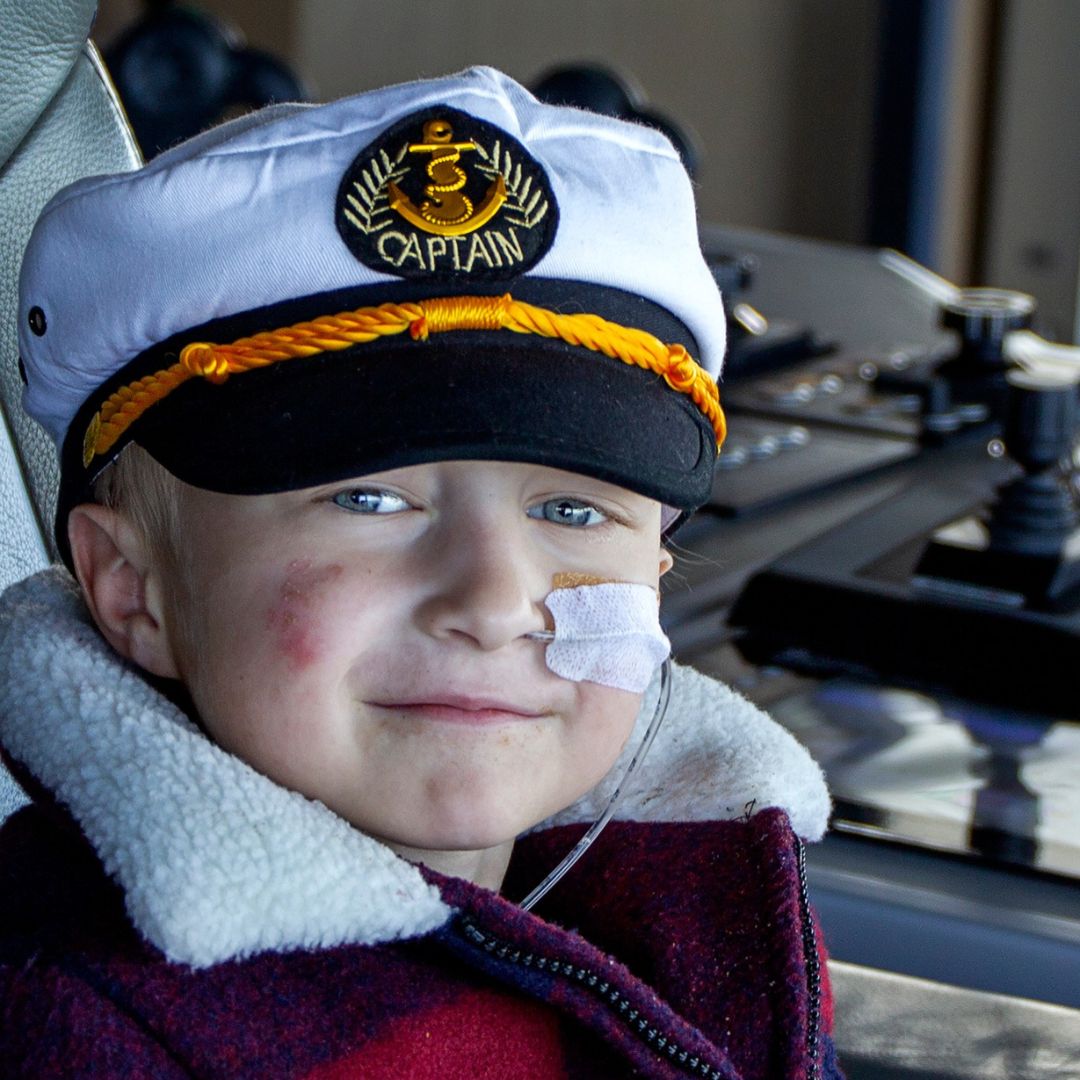 Wish child Morris wearing a sailor cap
