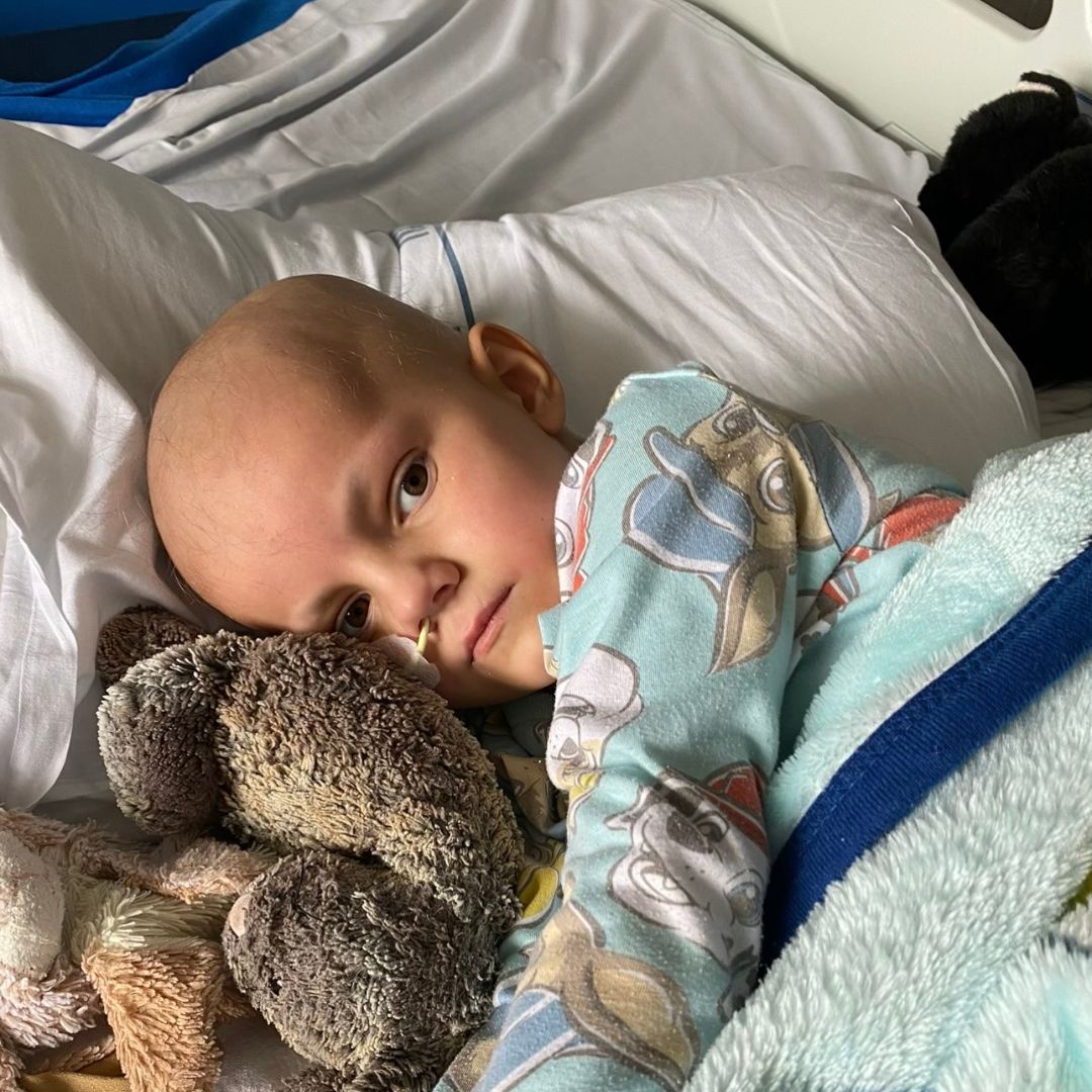 Wish Child Jasper lies in his hospital bed