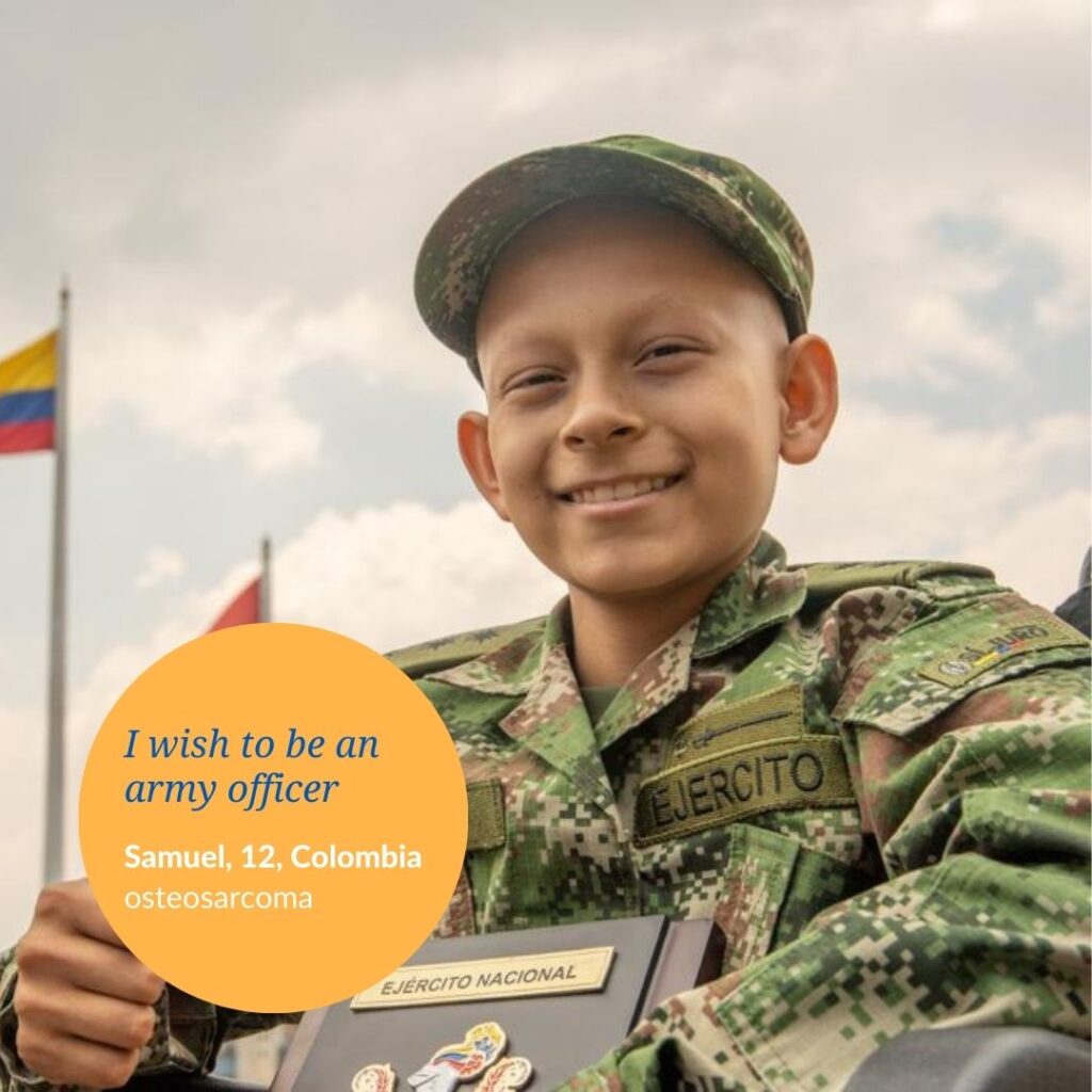 A smiling young boy in a Colombian army uniform holds a plaque. The Colombian flag is in the background. Text reads: Samuels wish to be an army officer. Samuel, 12, Colombia. osteosarcoma.